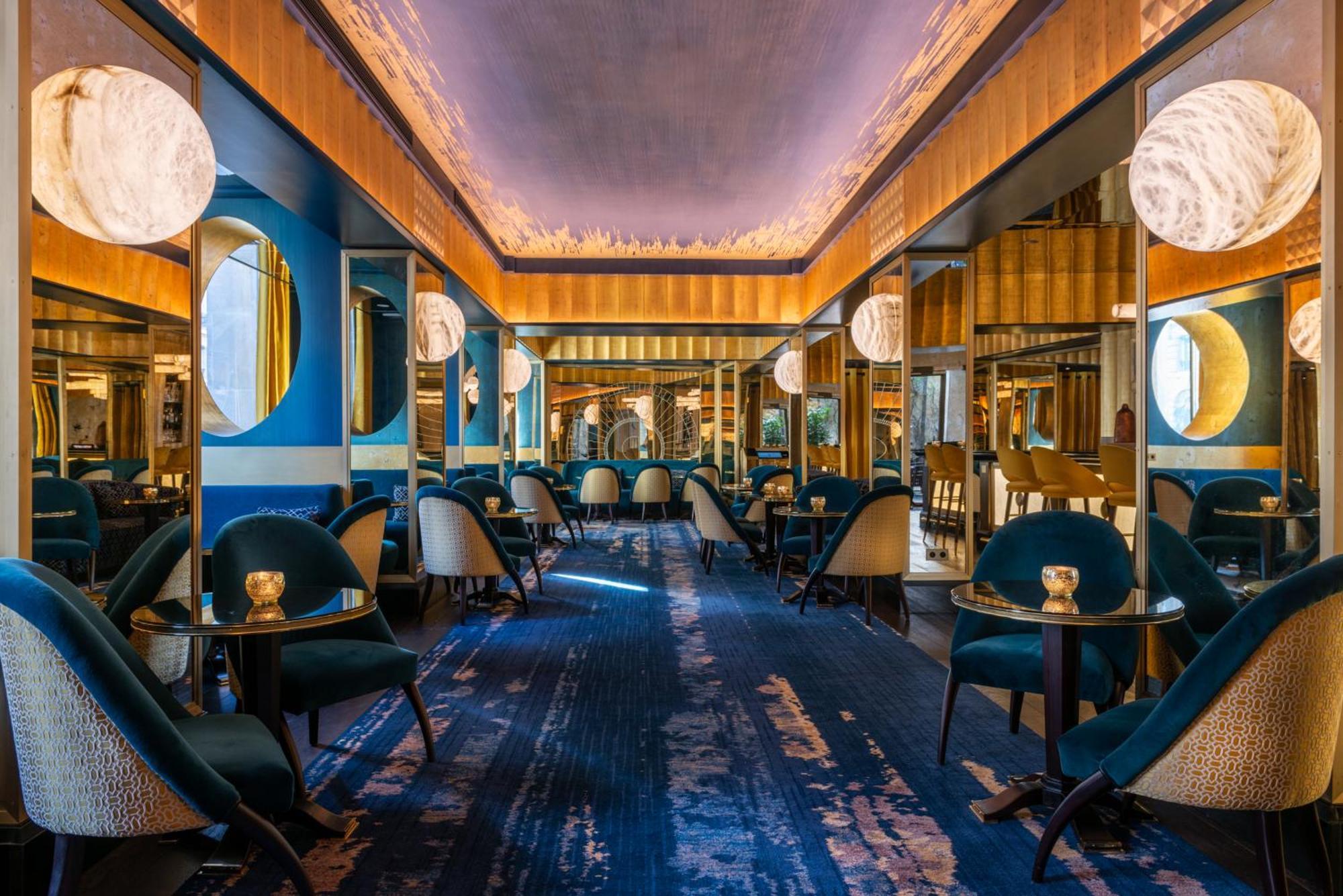 호텔 뒤 컬렉션네어 아크 드 트리옹프 파리 외부 사진 The interior of the restaurant
