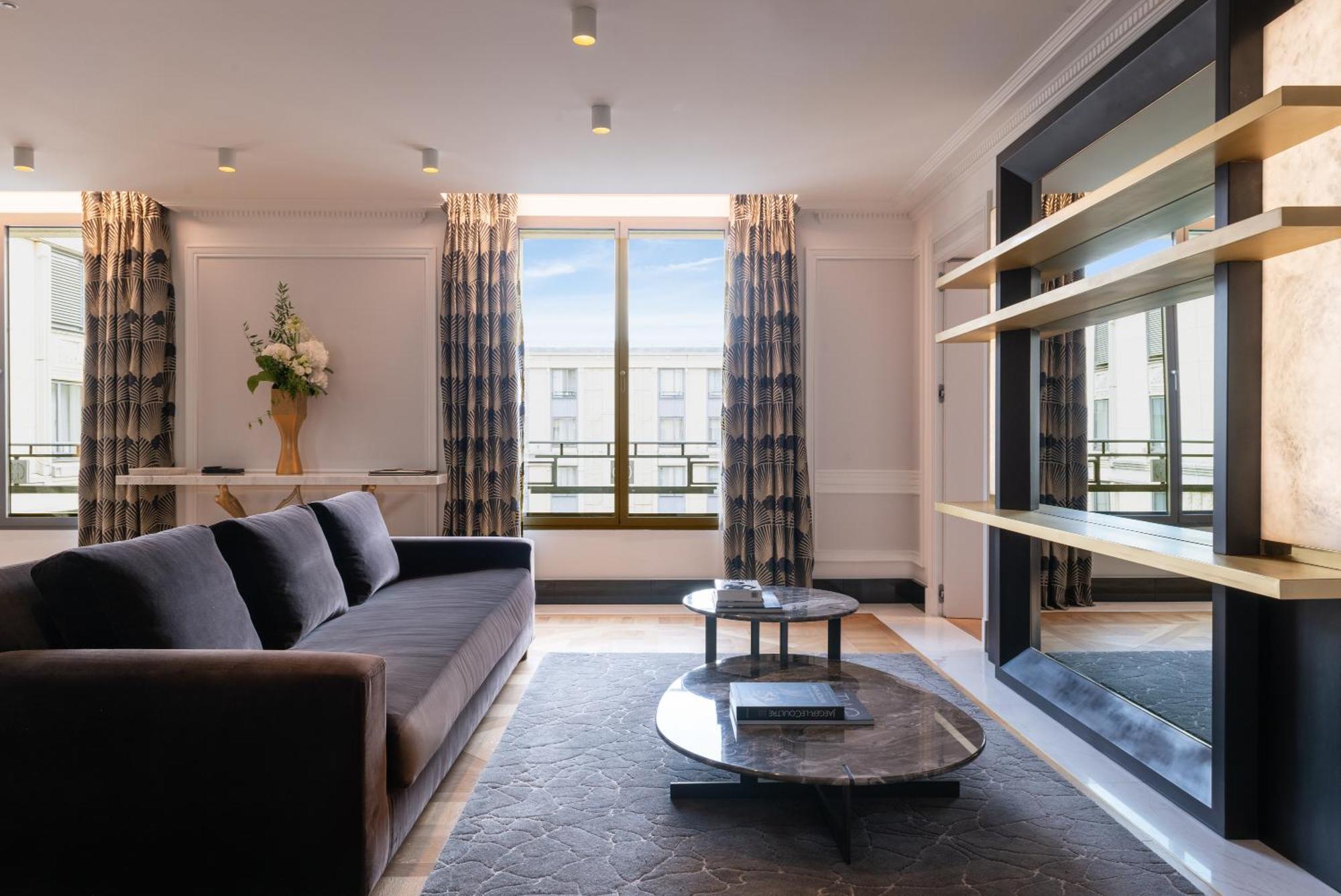 호텔 뒤 컬렉션네어 아크 드 트리옹프 파리 외부 사진 The interior of a typical apartment